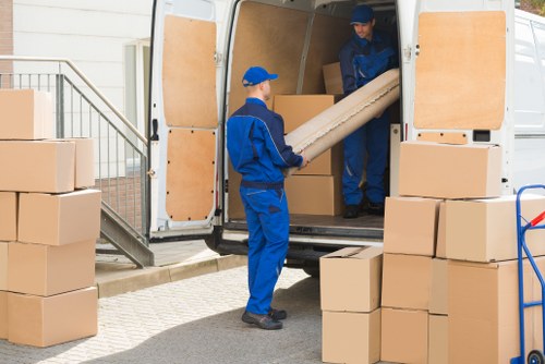 Storage boxes and organized items in a Millhill storage space