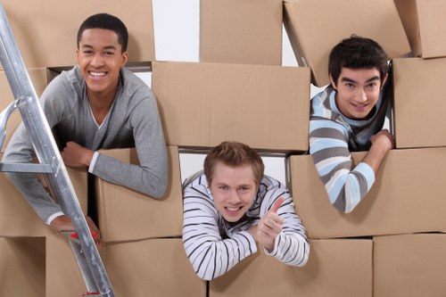 Packed boxes and furniture prepared for small removals in Millhill