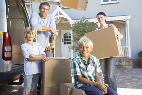 Packed boxes and furniture ready for house removals in Millhill